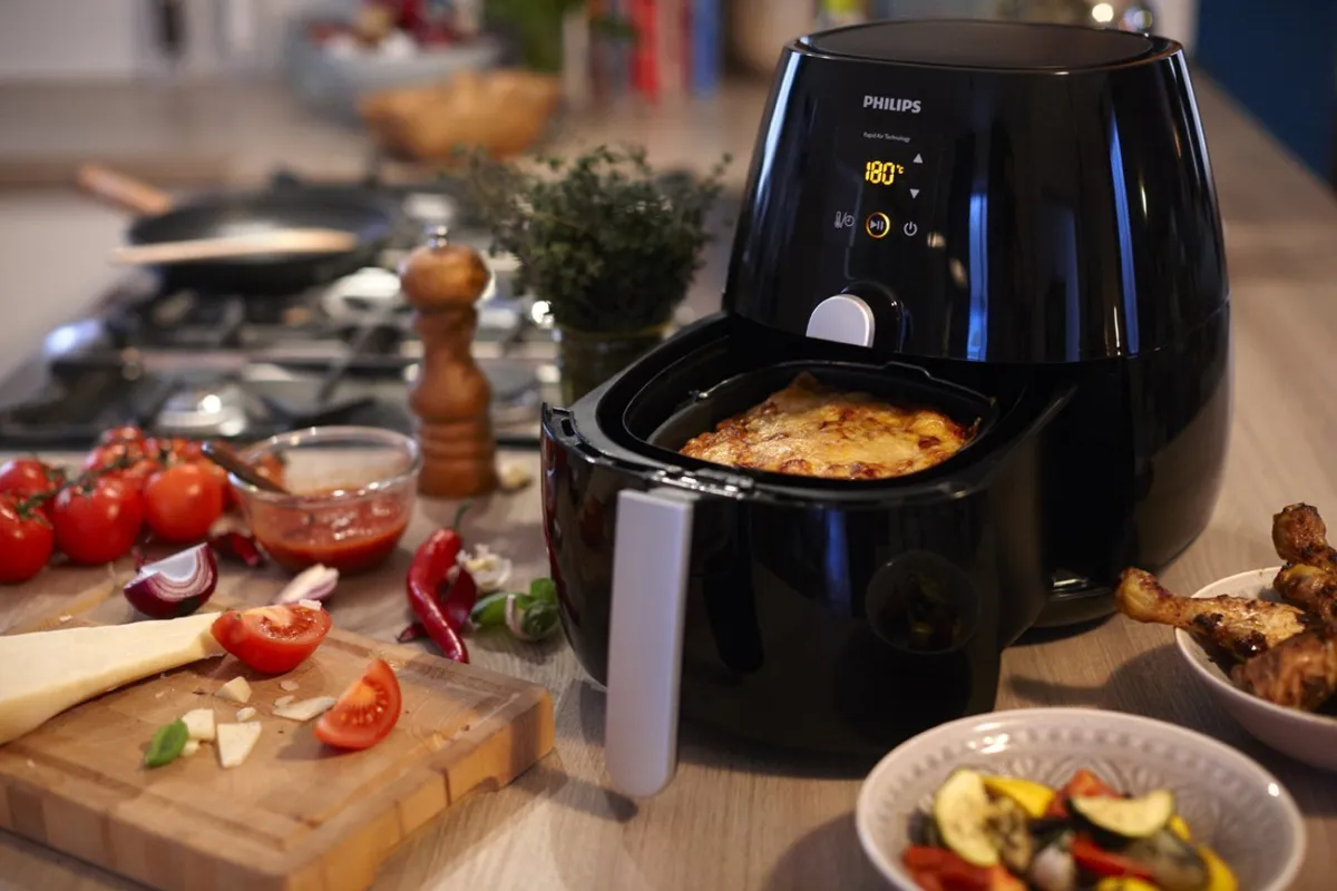 Auf Wiedersehen, Mikrowelle: Diese Taste des AirFryers wird Ihnen das Leben erleichtern, nur wenige kennen sie